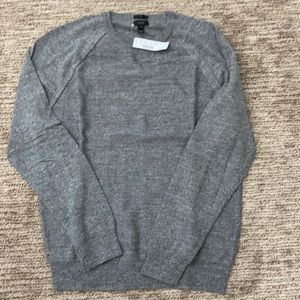 Neve worn Jcrew sweater, with tags